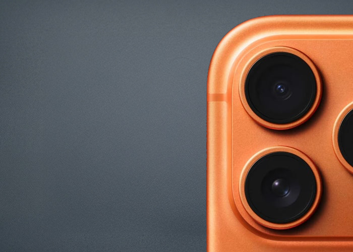 An orange iPhone 17 is shown with the the cameras being highlighted.