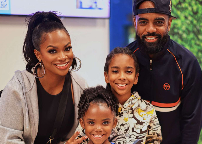 Kandi Burruss and Todd Tucker with their children Ace Tucker and Blaze Tucker. 