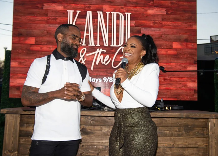 Kandi Burruss and Todd Tucker at a promotional event for their Bravo Tv show Kandi and the Gang.